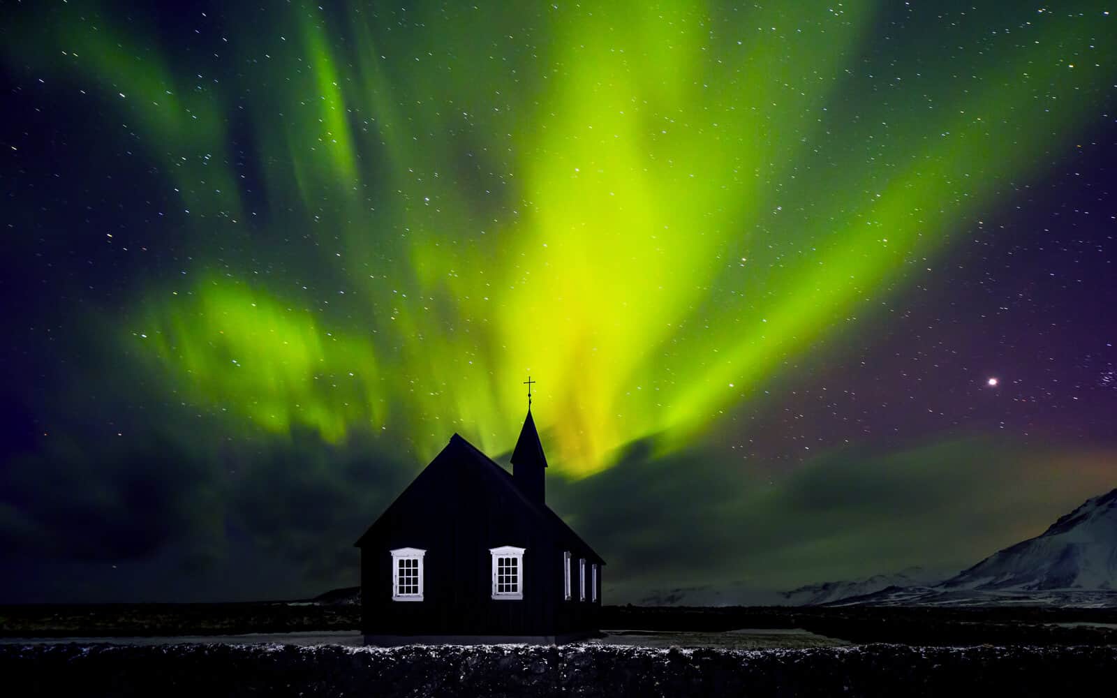 Church and northern lights - Best Hotels in Iceland for Northern Lights