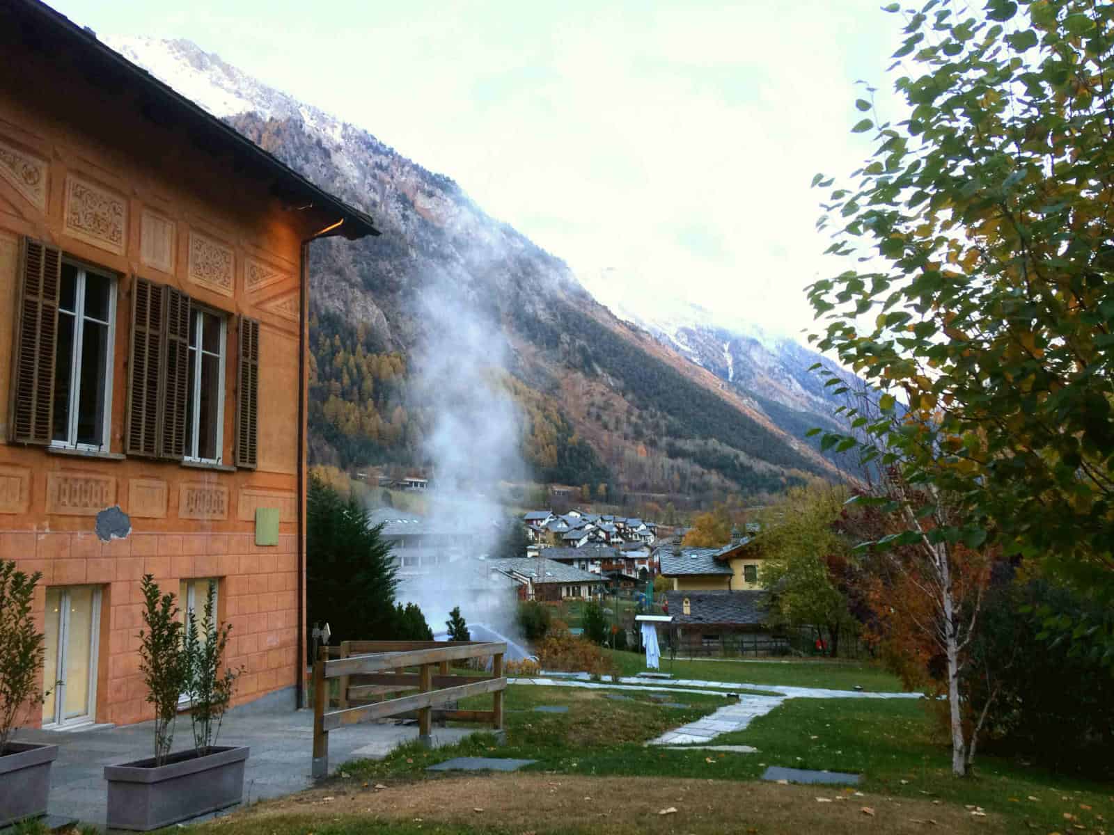 view of hotel with mountains in the background