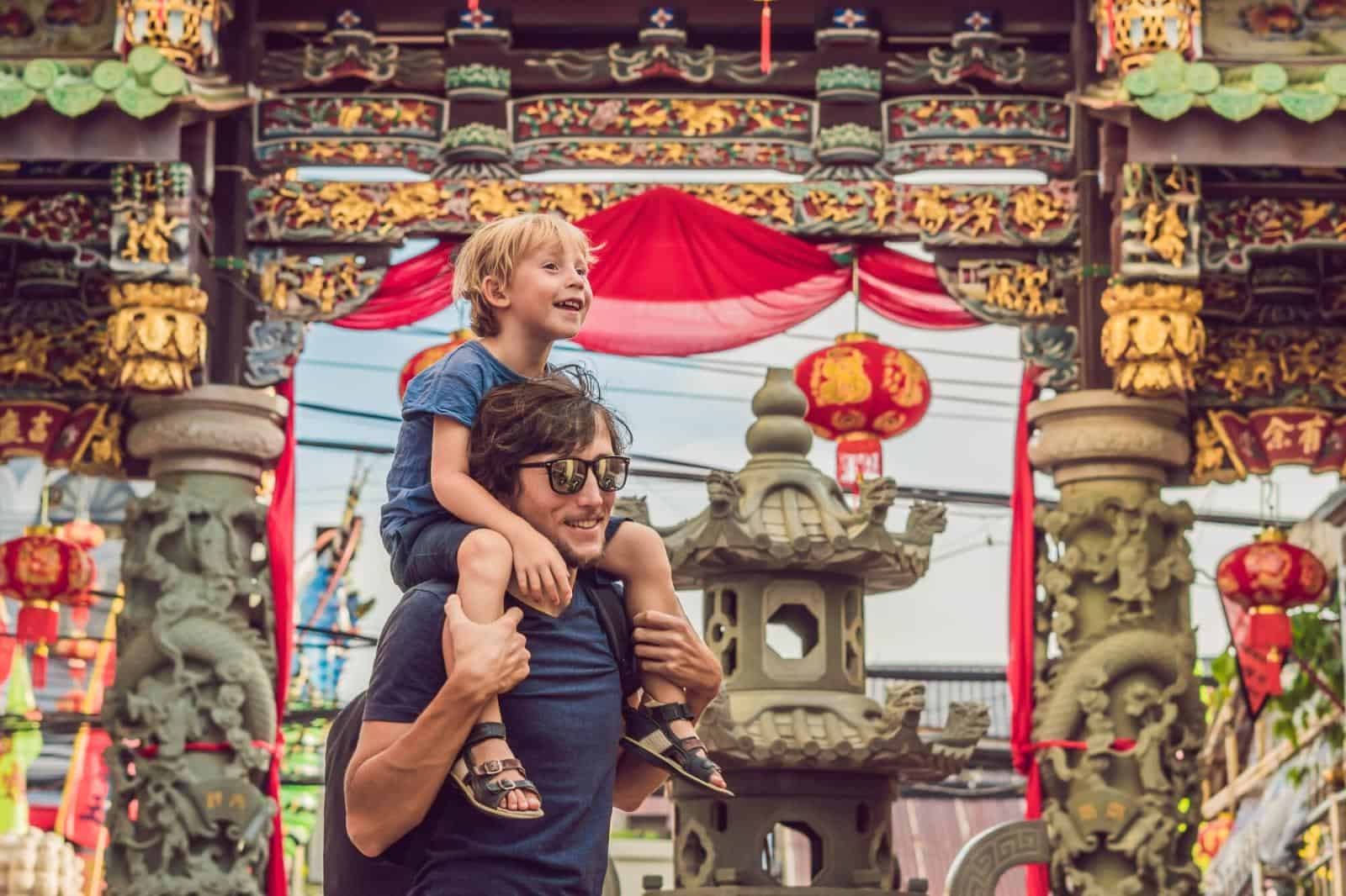 Father and Daughter at Thai temple - Best Asian Countries to Visit with kids - Thailand with kids 