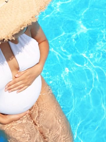 Pregnant woman in pool - Best babymoon instagram captions and quotes