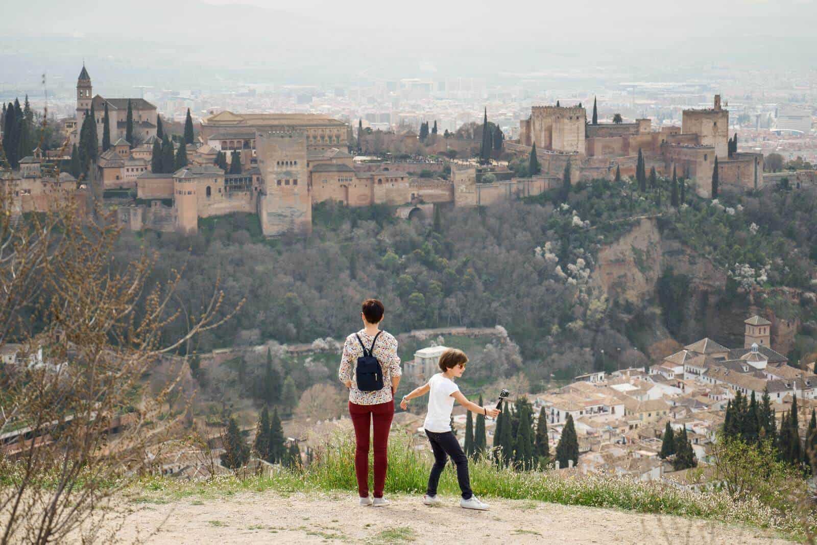 Family overlooking Granada - Visiting Granada with Kids