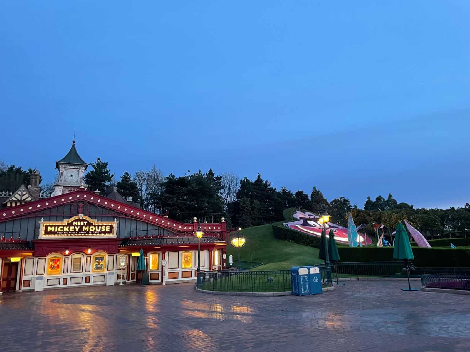 view of fantasyland during early magic hour