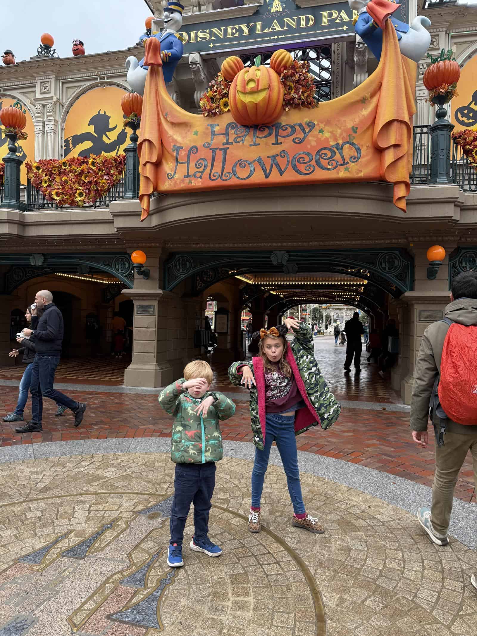 Halloween at Disneyland Paris - two kids and halloween decorations